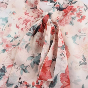 Floral print chiffon midi dress for women featuring a bow tie neckline and waist belt