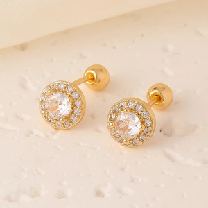 Detailed macro view of gold-plated stud earring with halo cubic zirconia and screw-back