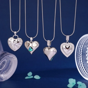 Silver-toned heart pendant necklaces with cubic zirconia and shell inlays on snake chain