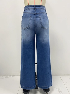 Vue arrière du jean taille haute à jambes larges en denim bleu foncé délavé vintage