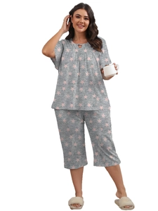 Detail of grey short sleeve loungewear with pink star print and cutout neckline