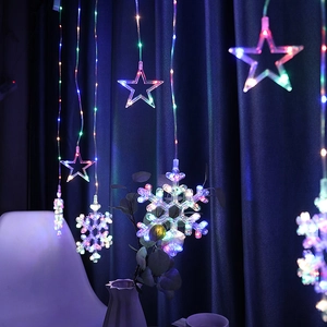 Colorful LED curtain string lights with star and snowflake pendants for bedroom decoration