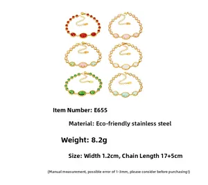 Detailed view of stainless steel bracelets with oval glass stones and 5A zircon accents