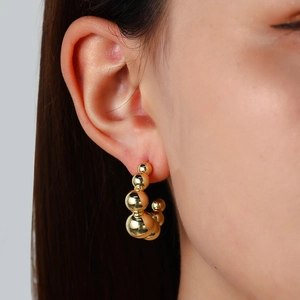 Polished 18k gold plated hollow ball C-shaped stud earrings for a minimalist look