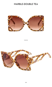 Front and side views of marble pattern cat-eye sunglasses with gradient brown lenses