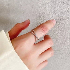 Minimalist irregular 925 sterling silver ring with cross line design on hand