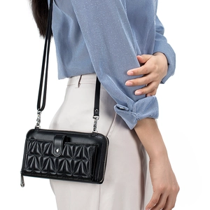 Chic black geometric quilted crossbody phone bag with adjustable strap for women