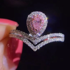 V-förmiger Doppelring aus Silber mit birnenförmigem rosa Stein und Glanz-Halo