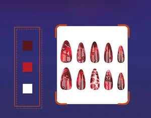 Detailed macro view of 10-piece almond fake nails with 3D red and black marble texture