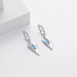 Detail of 925 sterling silver heart earrings with blue opal evil eye and white zircons