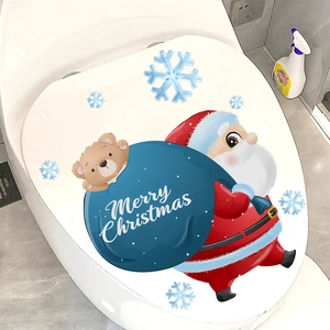 Detail of Santa Claus and bear waterproof PVC sticker on a white toilet lid decoration
