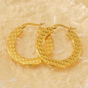 Polished gold stainless steel hoop earrings with star embossed texture on tray