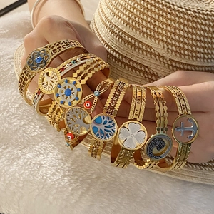 Bracciali placcati oro con motivi albero della vita, ancora e trifoglio in smalto