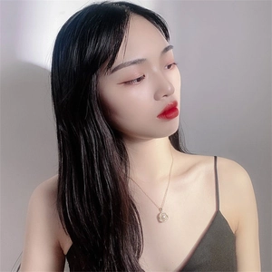 Elegant gold necklace with pearl pendant on model, luxury minimalist choker style