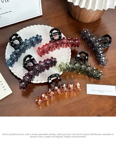 Detailed collection of floral rhinestone hair claws in six elegant translucent colors