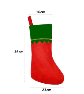 Detailed size specifications of the festive red and green Christmas stocking with gold trim