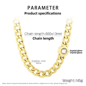 Detail showing 500mm x 13mm gold stainless steel Cuban chain with crystal pendant