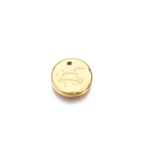 Detail of a round gold stainless steel pendant with an engraved constellation pattern