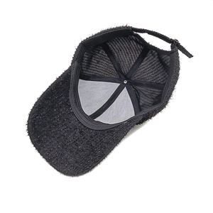 Women's black tweed baseball cap with subtle sequins and adjustable back strap