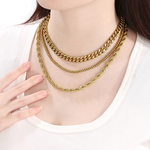 Chic layered 18K gold plated necklace set featuring Cuban and twisted link chain designs