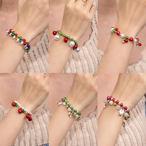 Christmas beaded bracelets with festive charms like bells and reindeer in a six-grid view
