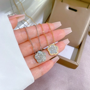 Sparkling gold and silver floral pendant necklaces with full diamonds on fine steel chains