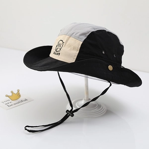 Detail of multi-color wide brim quick-dry bucket hat with adjustable windproof chin strap
