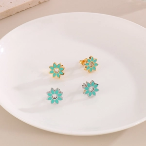 Boucles d'oreilles fleur de marguerite en or et argent avec émail turquoise et cristal