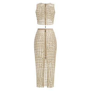 Detail of the back long zipper on the beige floral lace crop top and fish tail skirt set