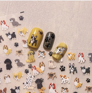 Detailed relief cartoon dog nail stickers with cute paw print patterns on false nails
