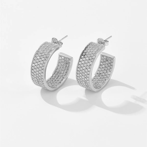 Silver-colored hip hop hoop earrings with micro-pave cubic zirconia in C-shape design