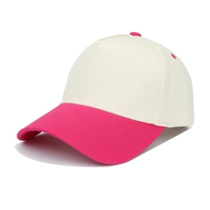 Classic two-tone baseball cap in off-white and pink cotton canvas on white background