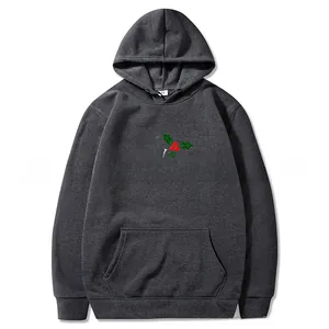 Close-up of Merry Christmas 2D print on charcoal grey hoodie with kangaroo pocket