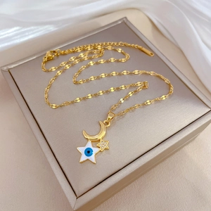 Luxury gold star and crescent moon necklace with blue evil eye pendant for women