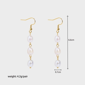 Detailed view of baroque pearl tassel earrings with 6.6cm length and gold hook design