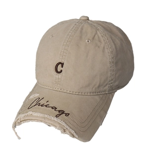 Distressed khaki baseball cap with leopard C embroidery and frayed Chicago brim detail