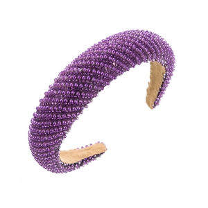 Detail of purple headband with hand-sewn pearls, rhinestones and anti-slip lining