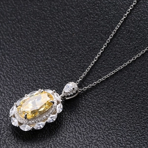 Luxurious S925 silver necklace with oval yellow stone and marquise diamond halo