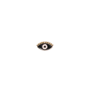 Macro shot of evil eye bead with black enamel and gold alloy eyelash frame detail