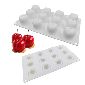 Macro view of 12-cavity cherry silicone cake mold for DIY French fruit mousse baking