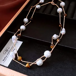 Collier double rang vintage avec œil de tigre, perles et pendentif bambou doré