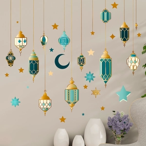 Detail of blue and gold Ramadan wall stickers with lanterns and crescent moon patterns
