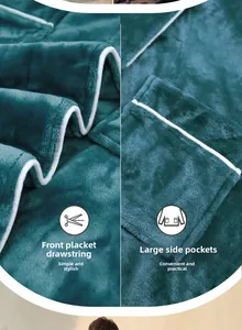 Detail of dark green flannel bathrobe showing white piping and large side pockets