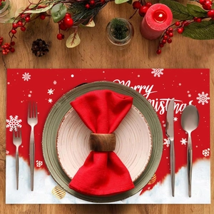 Red Merry Christmas table mat with snowman and snowflakes on wooden background