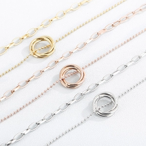 Triple interlocking ring pendant necklaces in gold, rose gold, and silver stainless steel