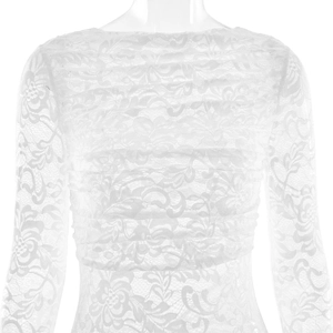 Detail of white floral lace fabric and long sleeves on backless bodycon maxi dress