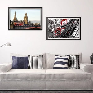 Modern rectangular black wooden frames set with London and Paris city landmarks prints