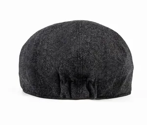 Rear view of dark grey wool flat cap showing textured fabric and elastic back closure