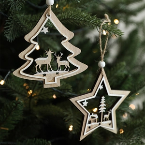 Christmas tree ornaments featuring wooden star and tree shapes with reindeer cutouts