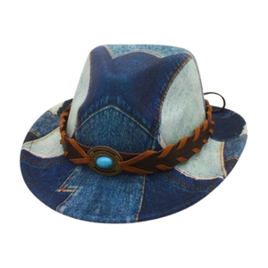 Macro view of blue denim patchwork cowboy hat with brown woven band and turquoise buckle
